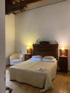 Katil atau katil-katil dalam bilik di Agriturismo Barchessa