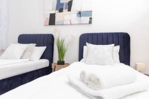 Postel nebo postele na pokoji v ubytování Apartman Tihana