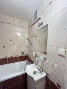 Ένα μπάνιο στο Apartament Zielony Zakątek +18 φωτογραφίες