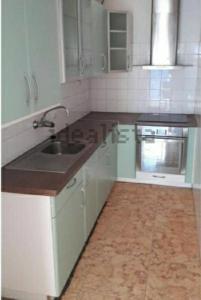 a kitchen with a sink and a counter top at SunandSea in L'Estartit