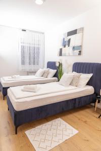 Postel nebo postele na pokoji v ubytování Apartman Tihana