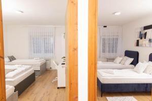 Postel nebo postele na pokoji v ubytování Apartman Tihana