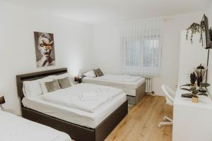 Postel nebo postele na pokoji v ubytování Apartman Tihana