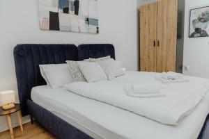 Postel nebo postele na pokoji v ubytování Apartman Tihana