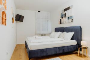 Postel nebo postele na pokoji v ubytování Apartman Tihana