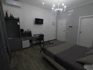 TV a/nebo společenská místnost v ubytování Karina's Rooms