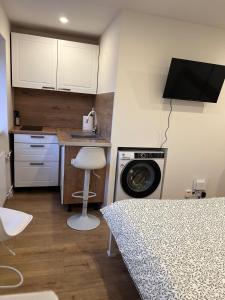 Η κουζίνα ή μικρή κουζίνα στο Simple & Stylish Studio +3 φωτογραφίες