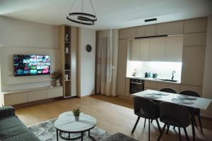 TV a/nebo společenská místnost v ubytování Seaside Grand Stay Apartment