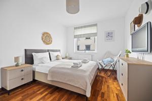 Posteľ alebo postele v izbe v ubytovaní INA Rent - Nadmorskie Apartamenty