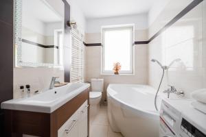 Kúpeľňa v ubytovaní INA Rent - Nadmorskie Apartamenty