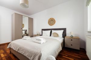 Posteľ alebo postele v izbe v ubytovaní INA Rent - Nadmorskie Apartamenty