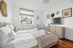 Posteľ alebo postele v izbe v ubytovaní INA Rent - Nadmorskie Apartamenty