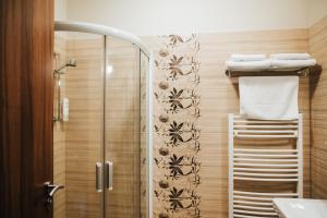 Koupelna v ubytování Hotel Elegance