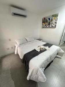 Katil atau katil-katil dalam bilik di Studio moderno com acessibilidade Mirant Vila Madalena