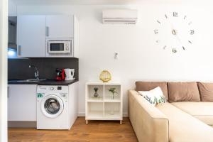 Kuchyň nebo kuchyňský kout v ubytování Beach garden apartment