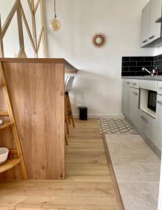 Kuchyň nebo kuchyňský kout v ubytování Appartement Hyper Cosy - Vue mer panoramique 180