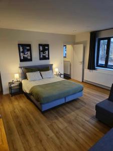Postel nebo postele na pokoji v ubytování Orient Herent - Boetiekhotel