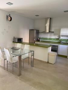 Η κουζίνα ή μικρή κουζίνα στο Apartamento en Alcalá de Guadaíra