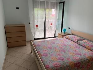 Ένα ή περισσότερα κρεβάτια σε δωμάτιο στο Two-bedroom vacation home