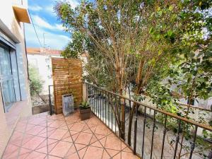 Balkoni atau teres di Duplex 3 Chambres Proche Gare Clim, WIFI, parking