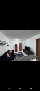 Χώρος καθιστικού στο Apartamento Caruaru bem localizado