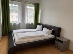 Letto o letti in una camera di Graf-Adolflux