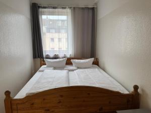 Letto o letti in una camera di Graf-Adolflux