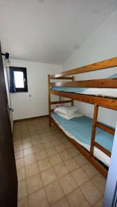 En eller flere senge i et værelse på Les Grandes Verdisses