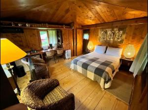 Postel nebo postele na pokoji v ubytování Nature Cabins - Santo da Serra