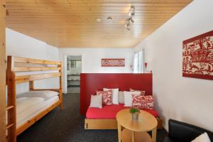Postel nebo postele na pokoji v ubytování Alpinhotel Bort
