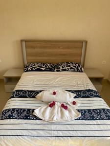 Postel nebo postele na pokoji v ubytování Esthas Lodge