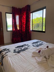 Postel nebo postele na pokoji v ubytování Esthas Lodge