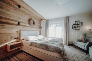 Postel nebo postele na pokoji v ubytování Landhaus Filzmoos