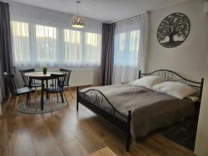 Llit o llits en una habitació de Willa Rodzinna