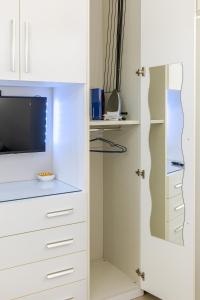 Μια τηλεόραση ή/και κέντρο ψυχαγωγίας στο Stella del Sud +33 φωτογραφίες