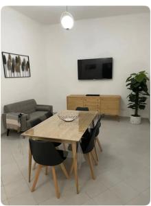 A television and/or entertainment centre at CASA VACANZE VIA CASALE