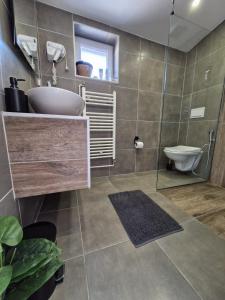 Koupelna v ubytování Gondola Apartment