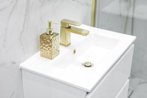 a bathroom sink with a soap dispenser on it at Traditional 1-Bed Edinburgh Apt in Edinburgh