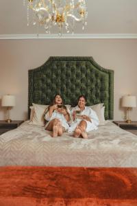 Voodi või voodid majutusasutuse Hotel Osvé Boutique Cali toas