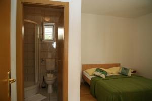 Kúpeľňa v ubytovaní Apartments Davor & Marija Sosic + 37 fotografií