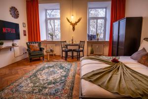 Ένα ή περισσότερα κρεβάτια σε δωμάτιο στο Bašty Apartments +28 φωτογραφίες