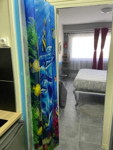 Кровать или кровати в номере Le Beaulieu