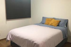 Postel nebo postele na pokoji v ubytování Departamento a 5 mins de Polanco