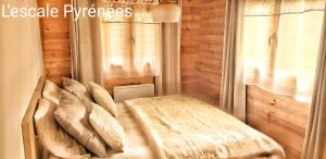 Posteľ alebo postele v izbe v ubytovaní Vue imprenable et jacuzzi 4 Etoiles