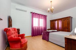 Ένα ή περισσότερα κρεβάτια σε δωμάτιο στο Casa O Limoeiro +39 φωτογραφίες