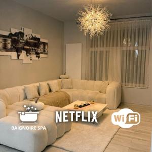 Posezení v ubytování l'imperial WIFI & Confort