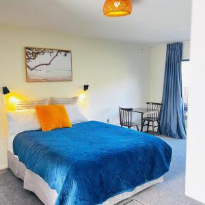 Postel nebo postele na pokoji v ubytování AAA Northlands Motel