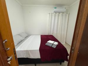 Postel nebo postele na pokoji v ubytování Casa aconchegante