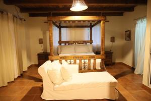 Ένα ή περισσότερα κρεβάτια σε δωμάτιο στο Villa Claudia Constanza