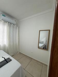 Postel nebo postele na pokoji v ubytování Casa aconchegante